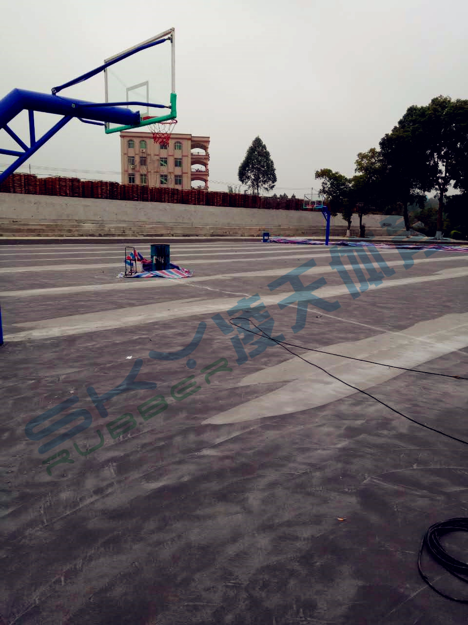 丙烯酸蓝球场案例：江门市鹤山宅梧小学弹性丙
